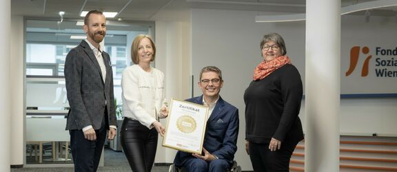 Gruppenfoto von 4 Personen